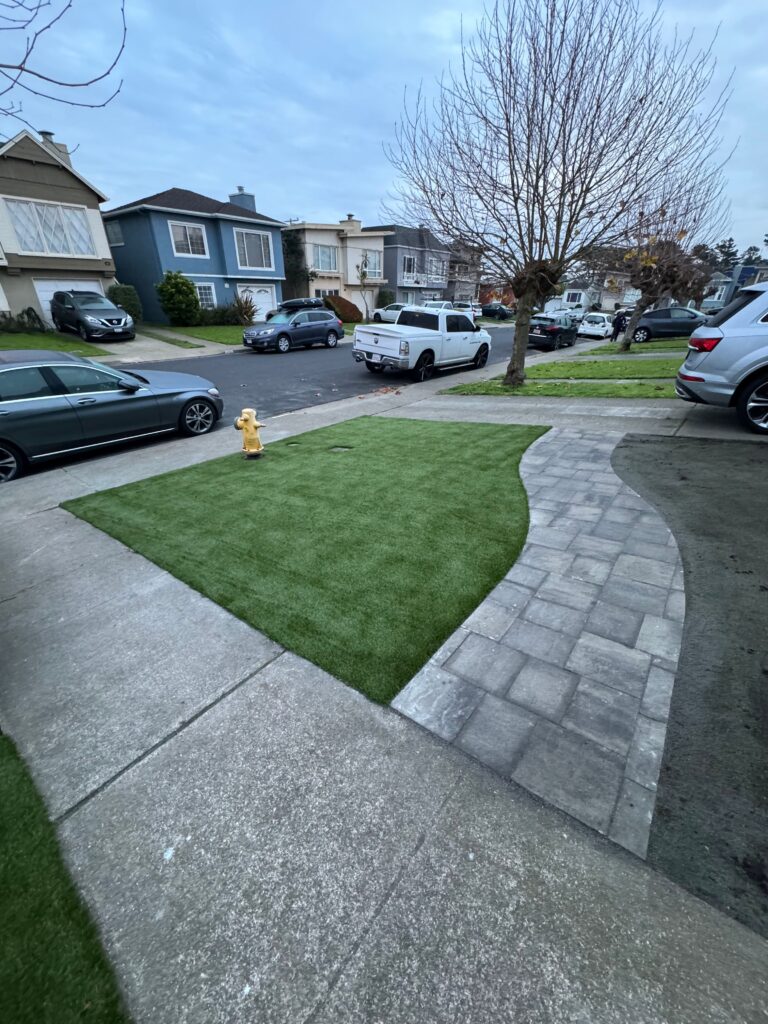 grass and paver driveway